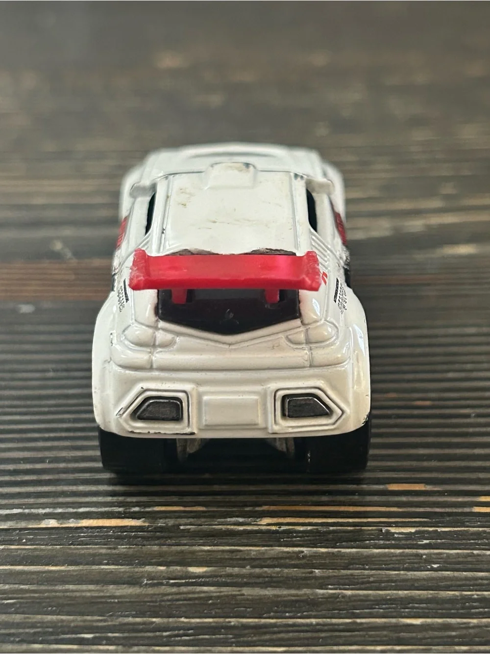 Volcano Shooters 202 White Toy Race Car with Red Wheels